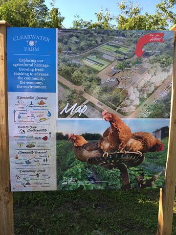 includes a map and a picture of roosters on some farm equipment